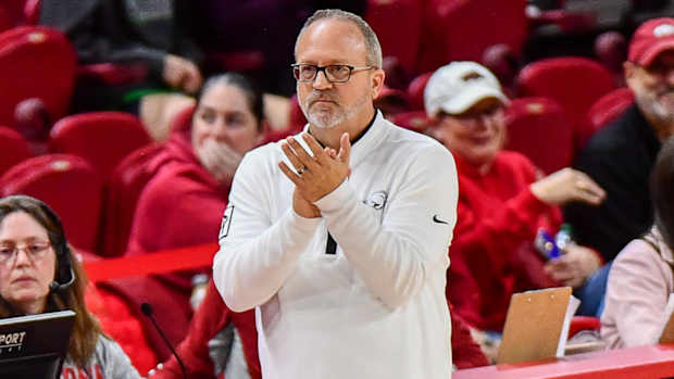 Razorbacks coach Mike Neighbors on sidelines against Mississippi State